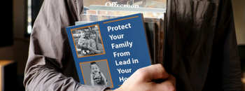 an arm holding a book that talks about protecting your family from lead in your home